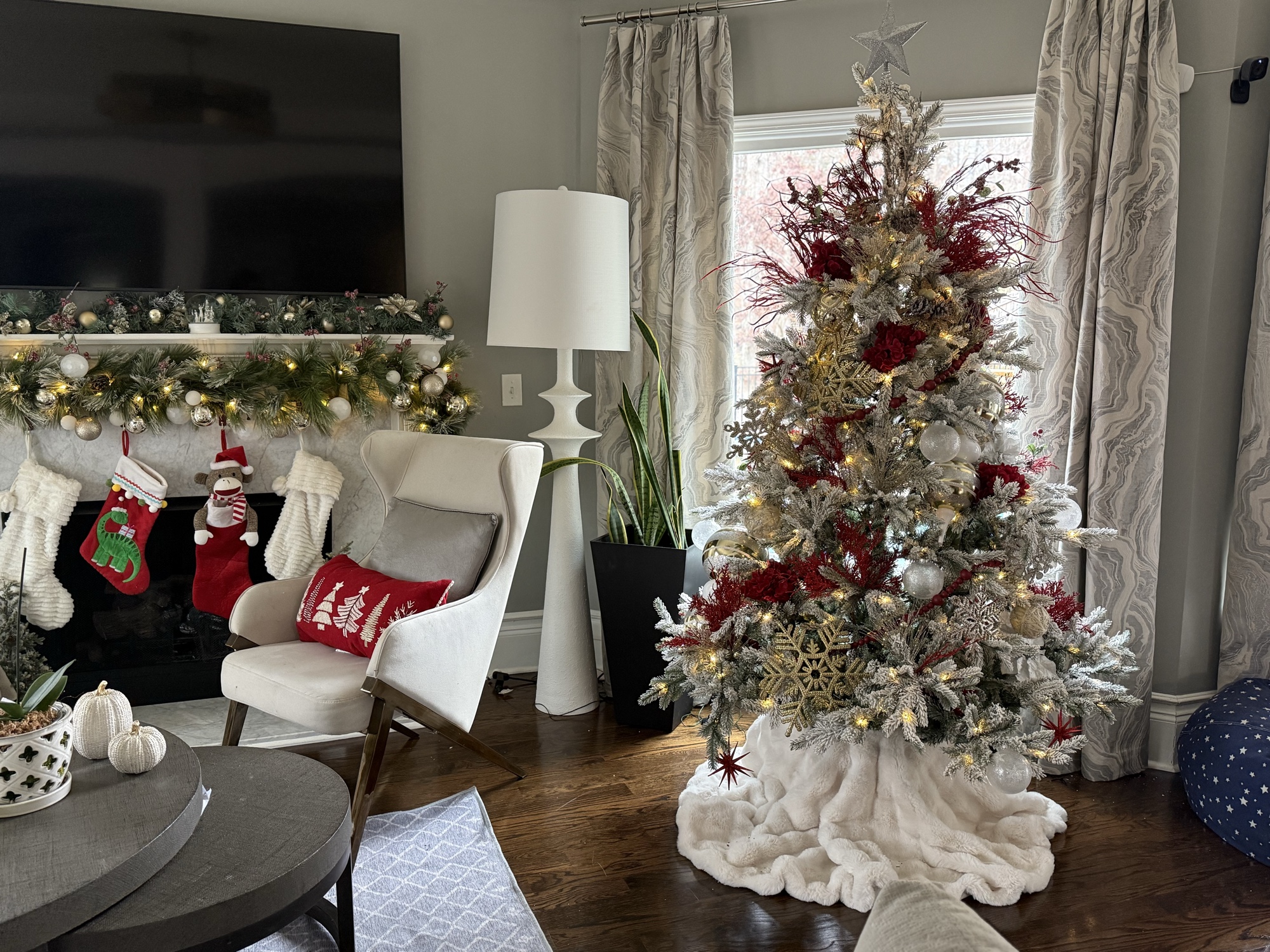 Holiday styling — flocked Christmas tree with red roses